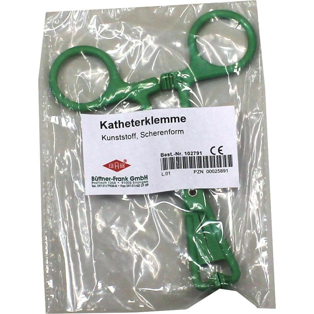 Gr&uuml;ne Katheterklemme aus Kunststoff in Scherenform in einer durchsichtigen Verpackung.