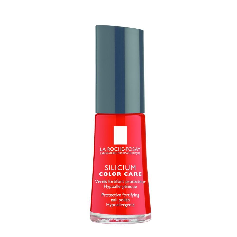 Rotes Nagellackfl&auml;schchen mit schwarzem Deckel und wei&szlig;em Aufdruck.