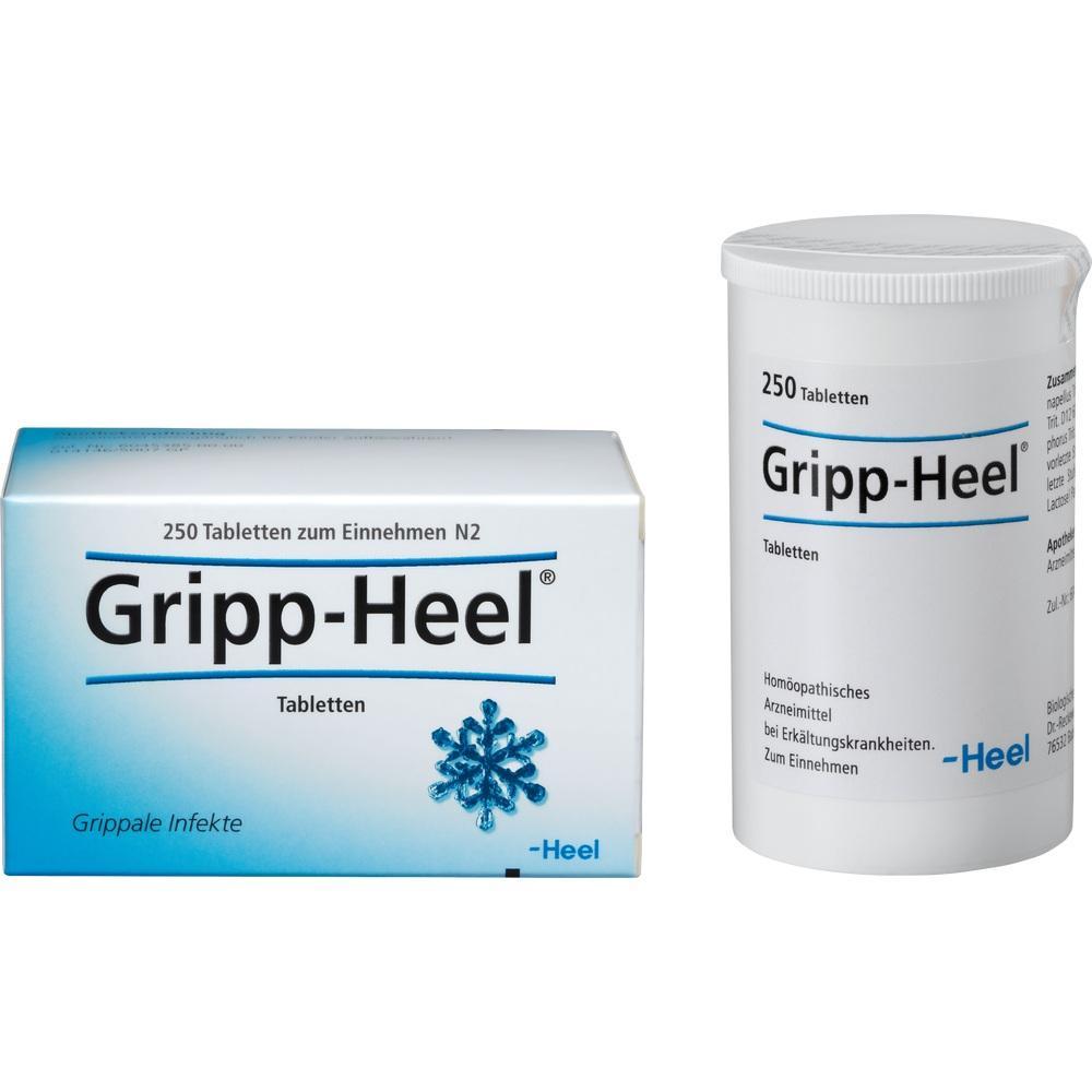 Eine Schachtel und Dose von Gripp-Heel Tabletten gegen Erkältungen.