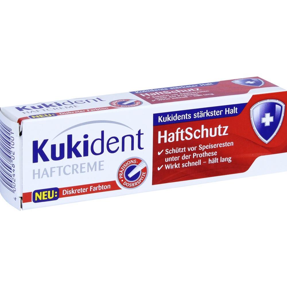 Eine Packung Kukident Haftcreme für Prothesen mit Haftschutz und diskretem Farbton.