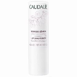 Eine weiße Lippenpflege-Tube von Caudalie mit Blumenmotiv.