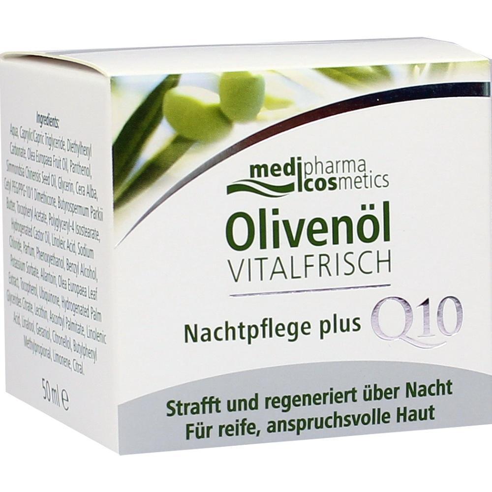 Eine weiße Verpackung von Nachtpflegecreme mit Olivenöl und Q10.