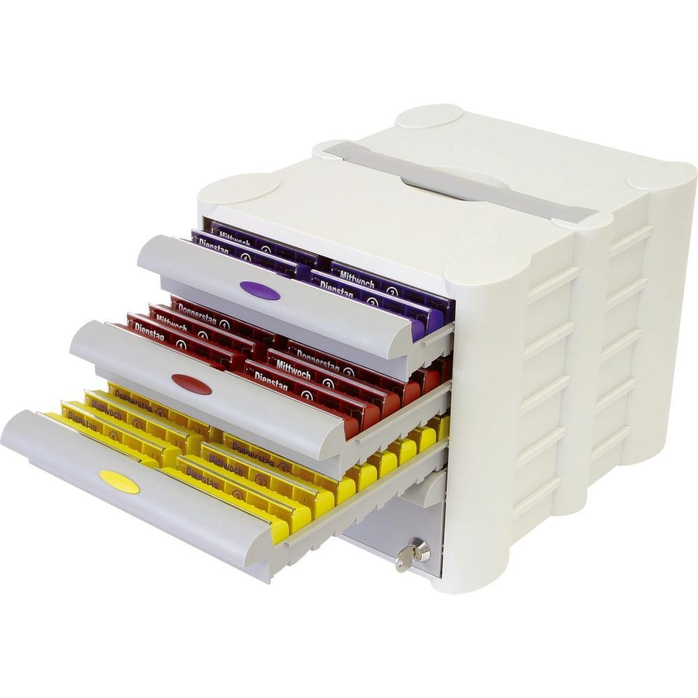 Ein weißer Medikamentenspender mit farbigen, herausgezogenen Schubladen.
