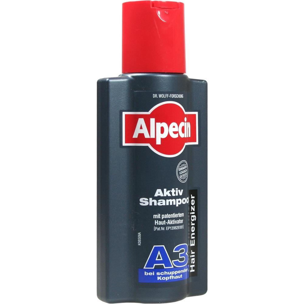 Eine Flasche Alpecin Shampoo mit rotem Deckel gegen schuppende Kopfhaut.