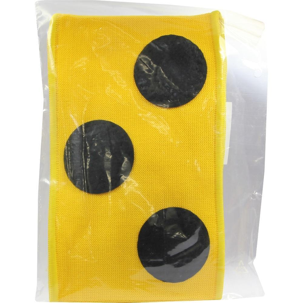 Gelbes Stoffstück mit drei schwarzen Punkten in einer Plastiktüte.