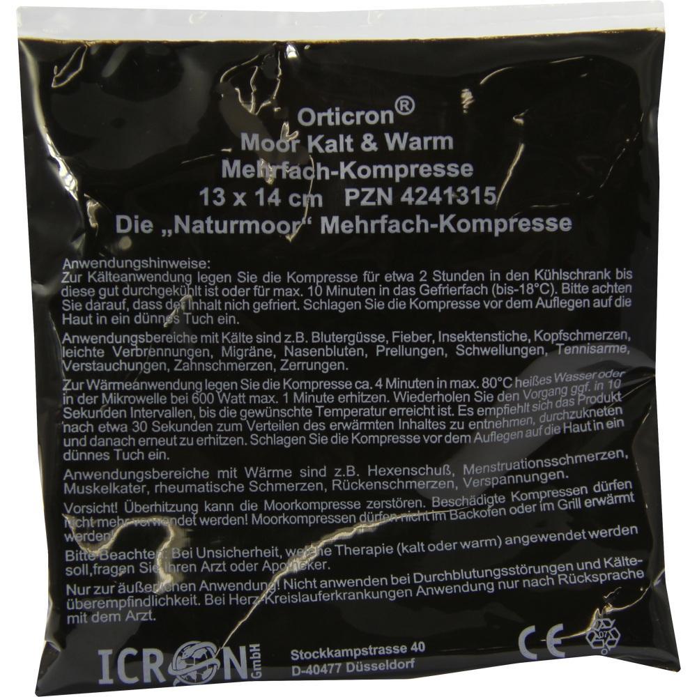 Schwarze Verpackung einer Moor-Kompressen mit Anwendungsanweisungen.