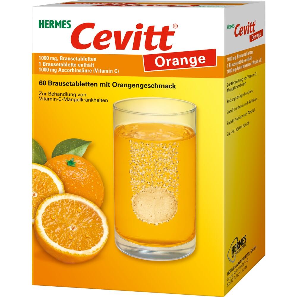 Orangensaft mit sprudelnder Brausetablette und frischen Orangen daneben.