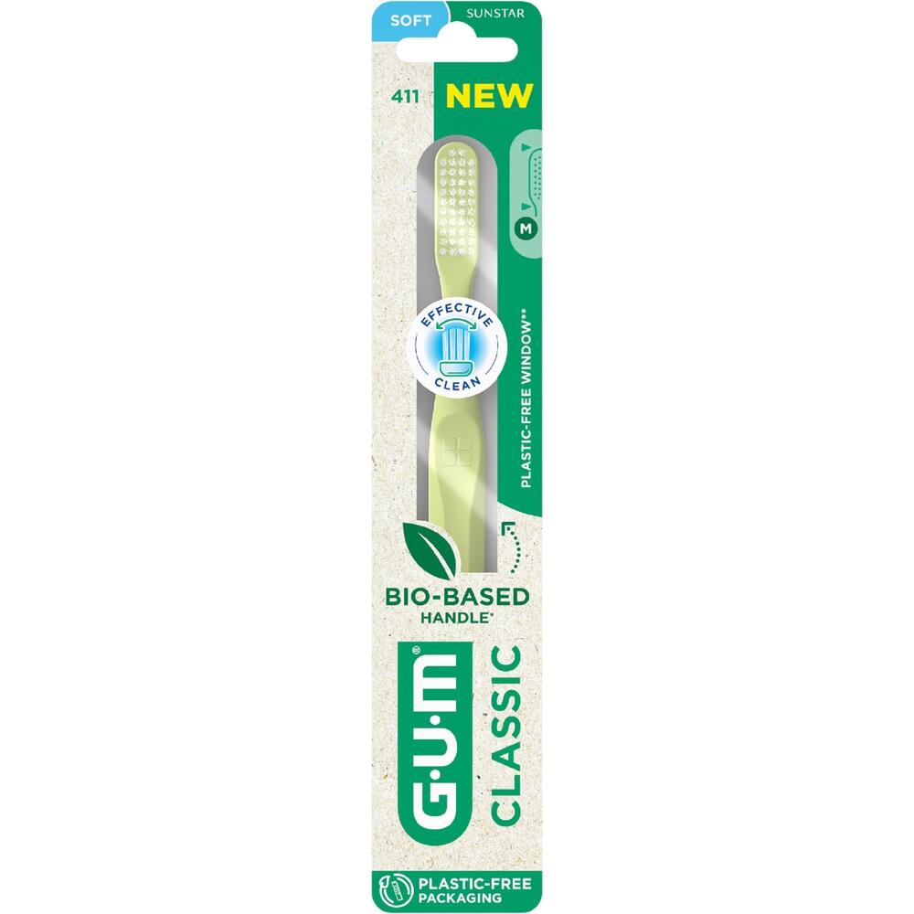 Eine Zahnbürste in einer plastikfreien Verpackung mit biologischem Griff.