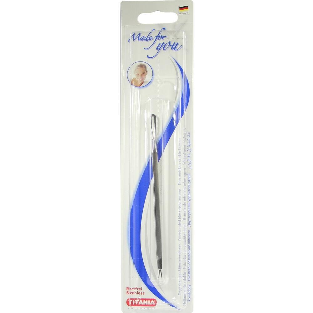 Verpackung mit einem silbernen Mitesserentferner aus Edelstahl.