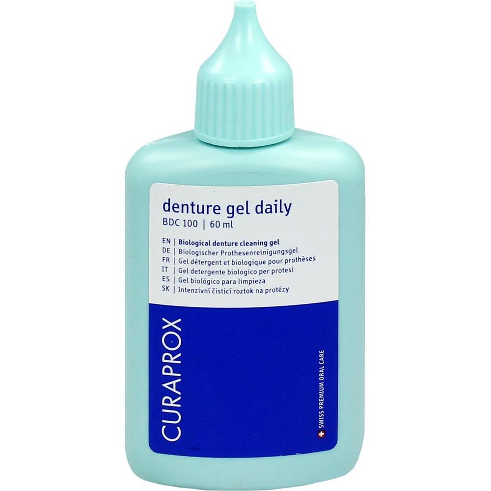 Eine hellblaue Flasche mit etikett als Zahngel für Zahnprothesen.