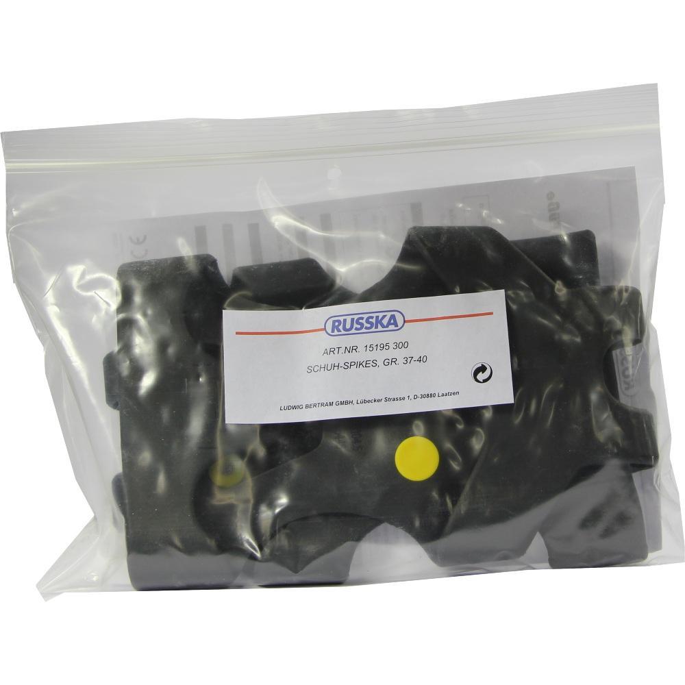 Schuh-Spikes in einer durchsichtigen Plastiktüte mit Etikett.