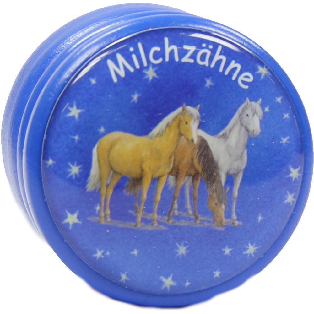 Runde blaue Schachtel mit drei Pferden und dem Wort "Milchzähne".