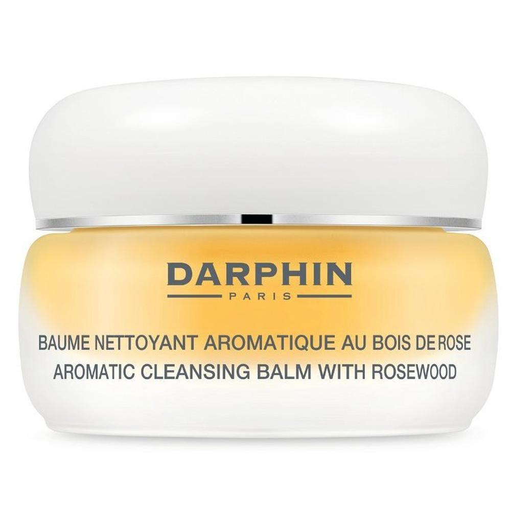 Gelbes Kosmetikglas mit der Aufschrift "Darphin" auf dem Deckel.