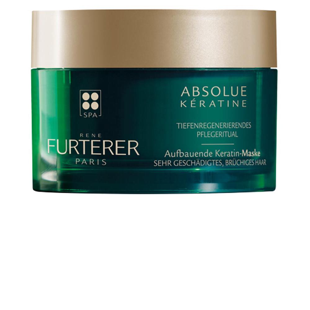 Grüne Dose mit Keratin-Haarmaske für beschädigtes Haar.