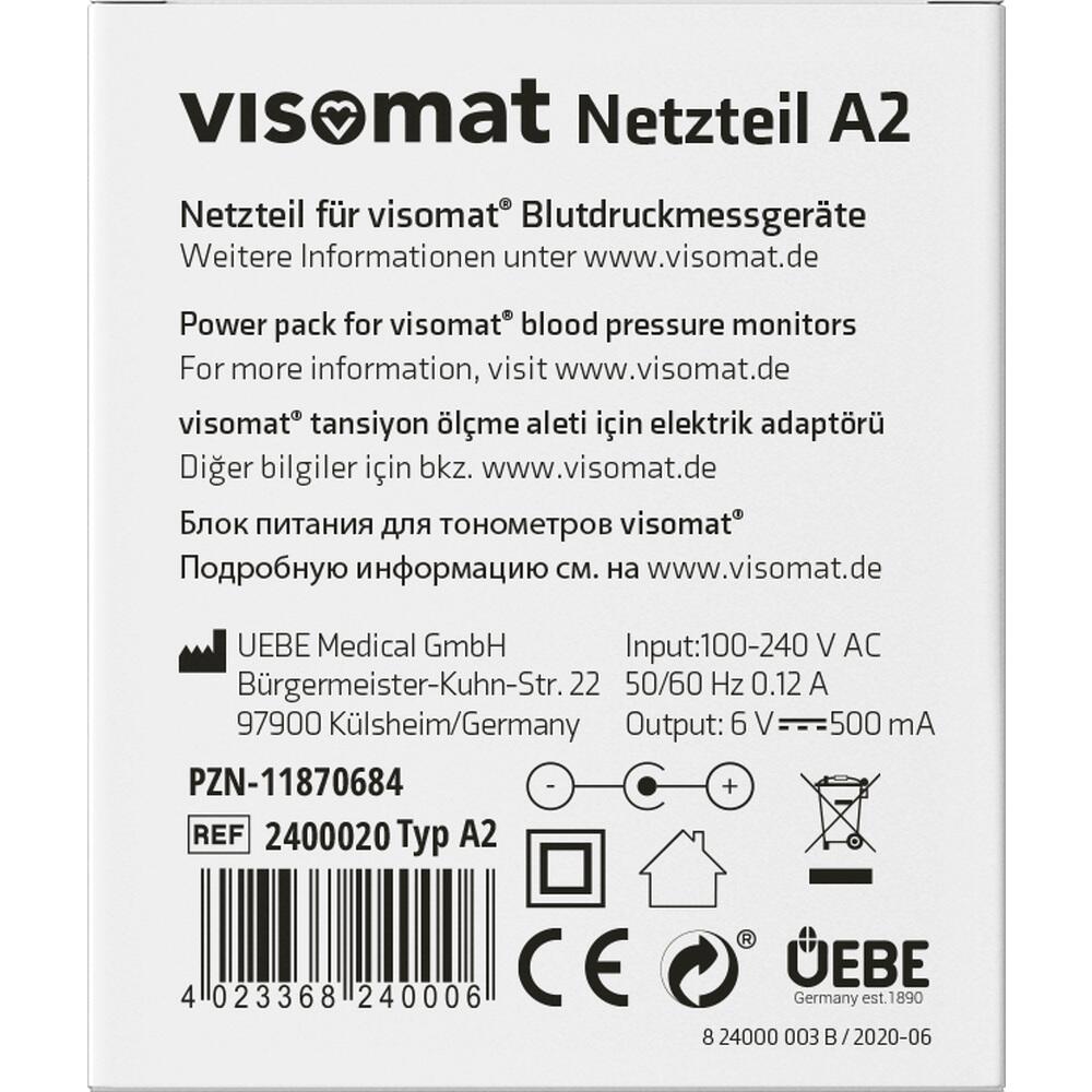Verpackung eines Netzteils für visomat® Blutdruckmessgeräte mit technischen Details.