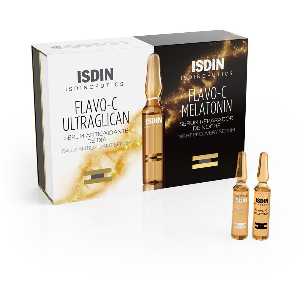 Zwei Ampullen mit Serums neben einer Box mit zwei verschiedenen Pflegeprodukten.