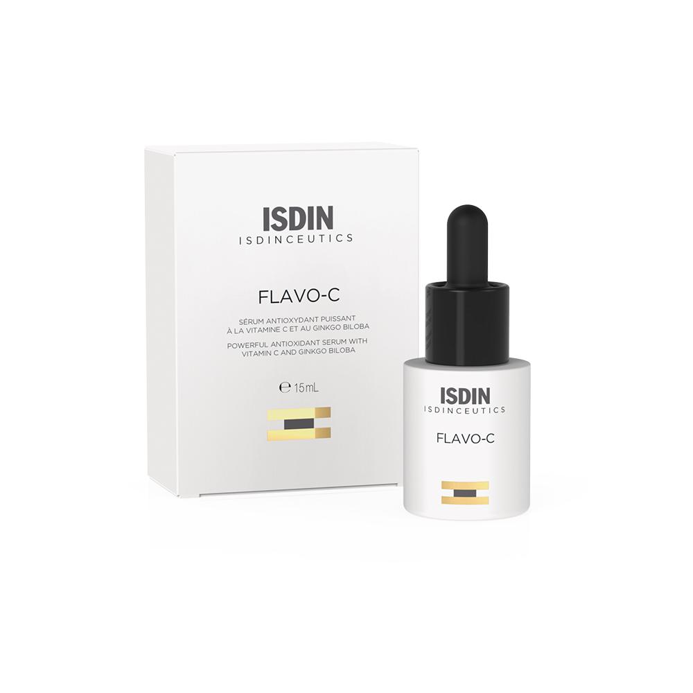Eine Flasche Serum mit Pipette neben einer Verpackung.
