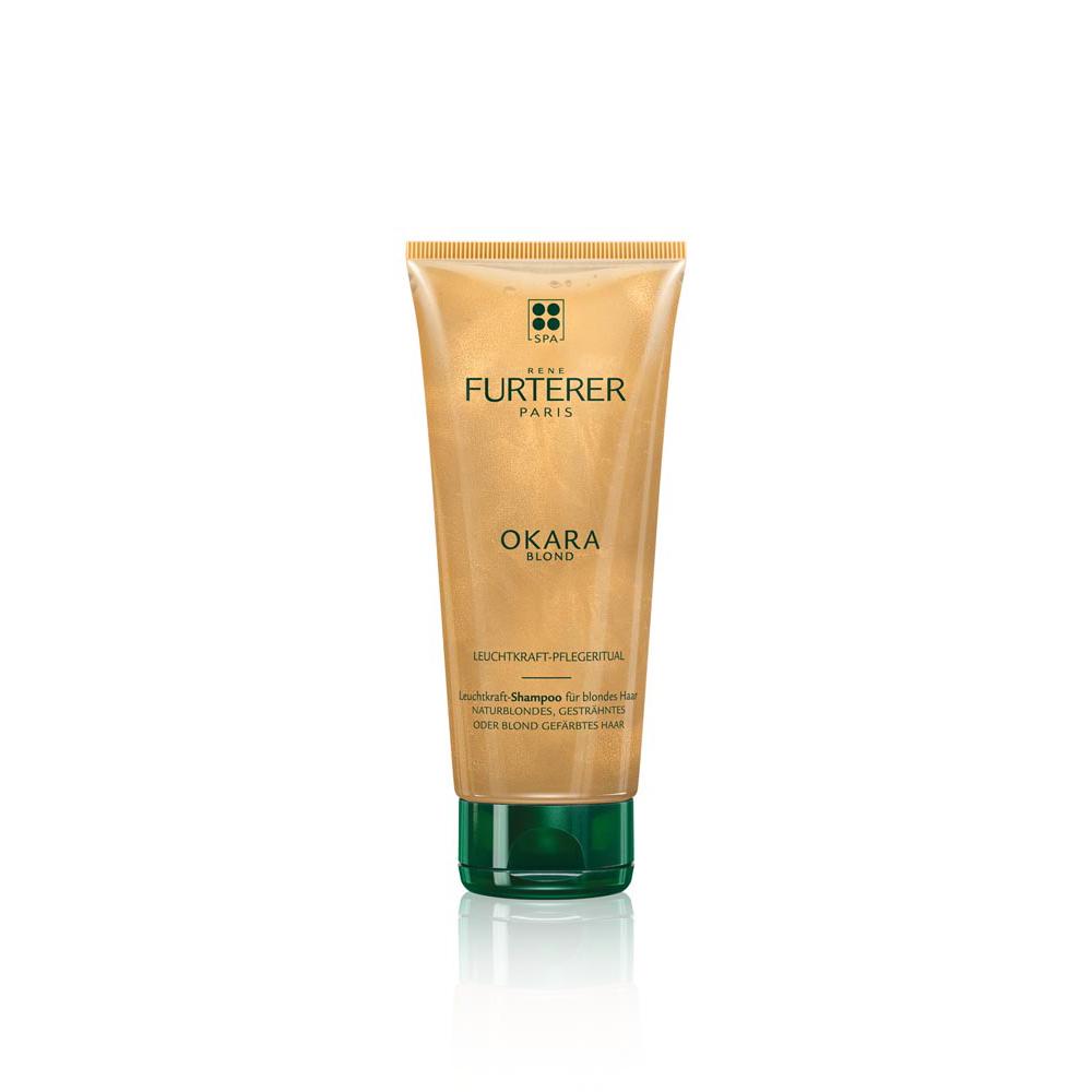 Goldene Tube mit grünem Deckel für blondes Haarpflegeprodukt.