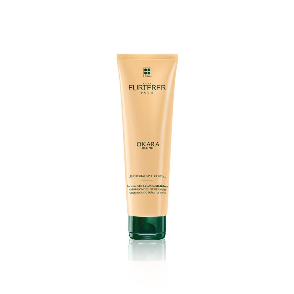 Beige Tube mit grünem Deckel, Aufschrift "Okara Blond".