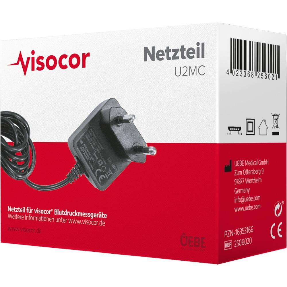 Auf dem Bild ist ein Netzteil in einer rot-weißen Verpackung zu sehen.