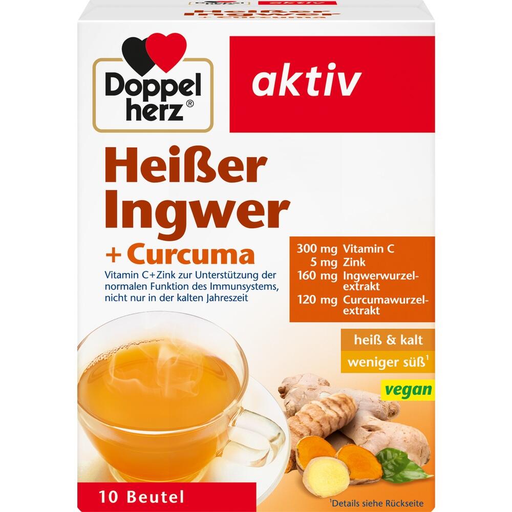 Eine Packung Doppelherz hei&szlig;er Ingwer und Curcuma Tee mit Tasse und Ingwerst&uuml;cken.