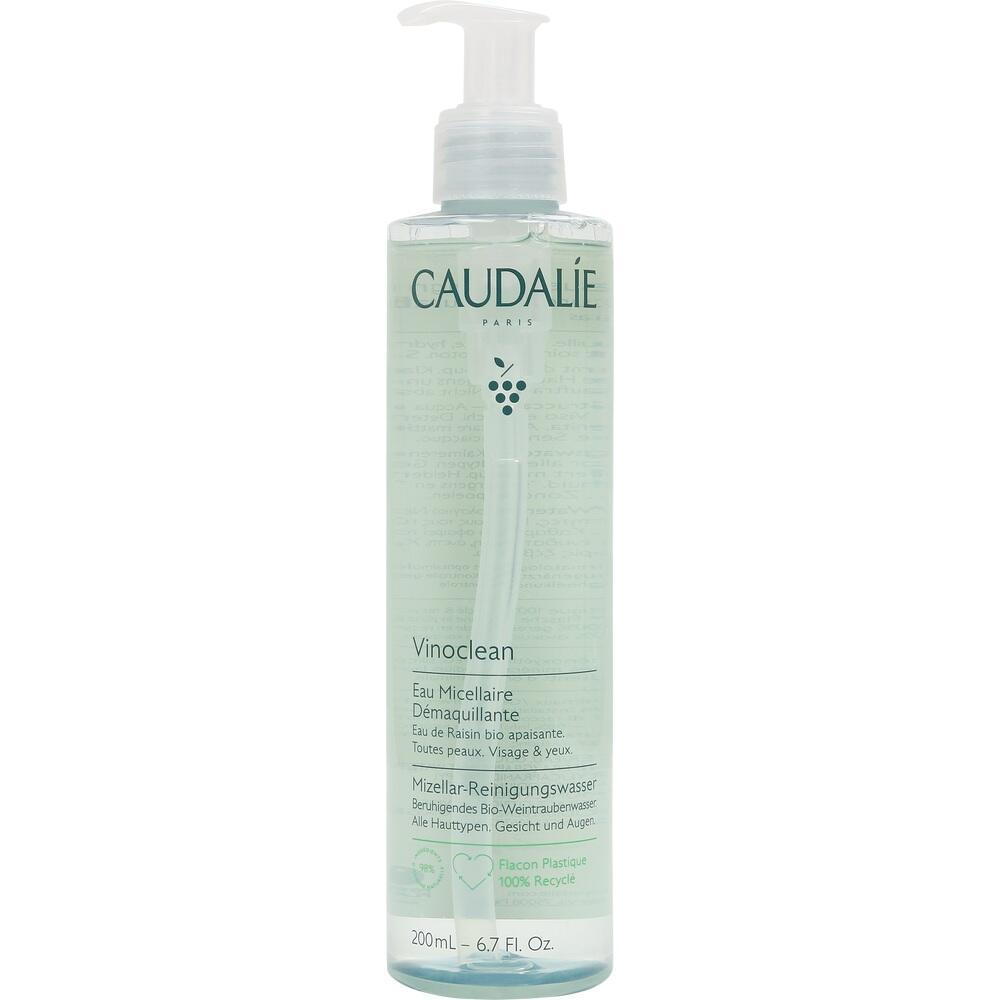 Eine transparente Flasche mit Reinigungswasser von Caudalie und einem Pumpspender.