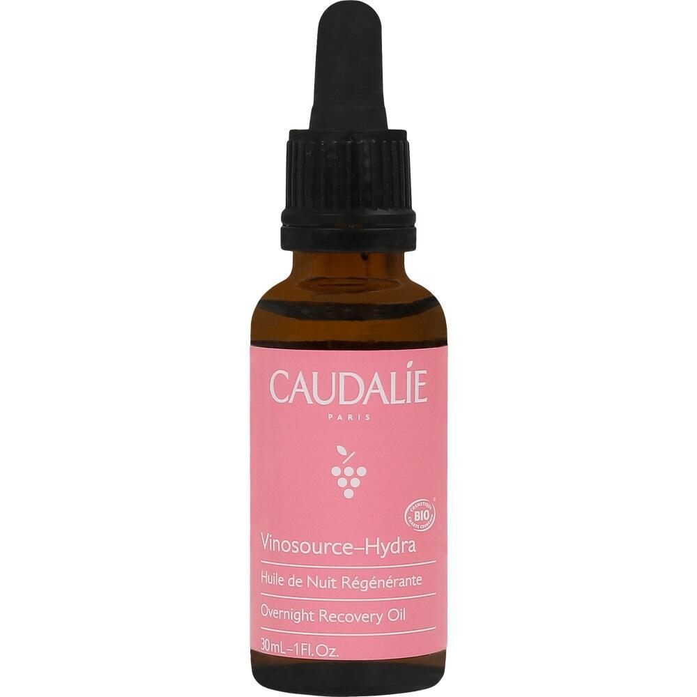 Braunes Fläschchen mit rosa Etikett und Pipette, darauf steht "Caudalie Vinosource-Hydra".