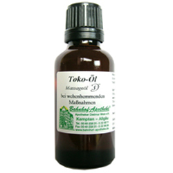 Braune Flasche mit Toko-&Ouml;l und wei&szlig;em Etikett.