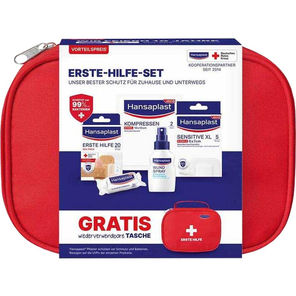 Rotes Erste-Hilfe-Set mit Verbandsmaterial und Spray auf der Verpackung.